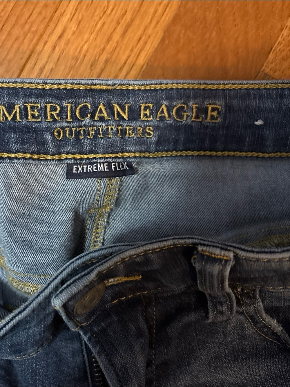 American Eagle Outfitters Dark Blue Jeans with Gold Stitching